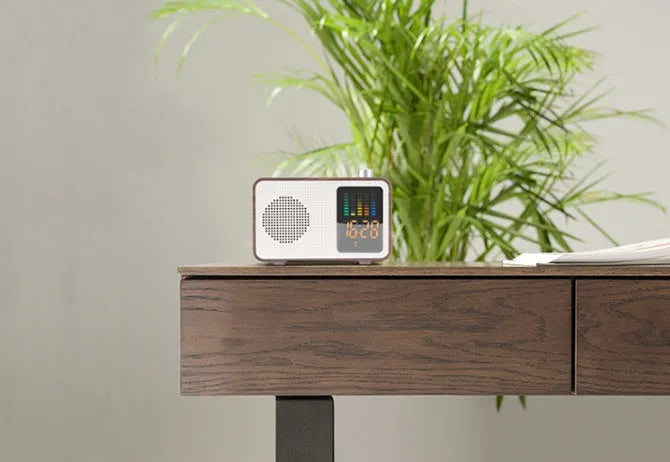 Brown wooden retro Bluetooth radio speaker with DAB and FM reception on wooden surface