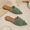 Women's denim flat slippers with a tassel, shown in available colours like apricot, black, and wine red.