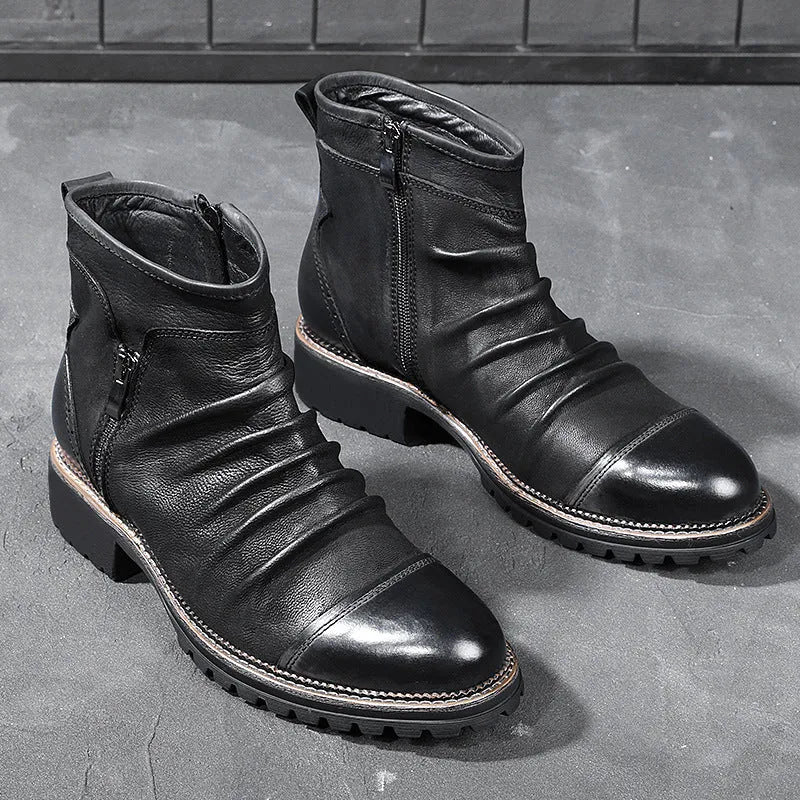 Men's black side-zip cowboy boots with embossed texture and a mid-height horseshoe rubber heel.