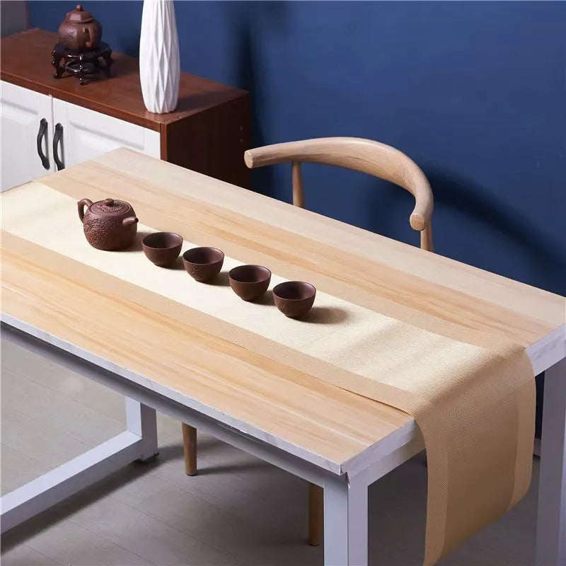 Modern PVC kitchen sink mat in a gradient bamboo colour on a countertop, showing its non-slip texture and size.