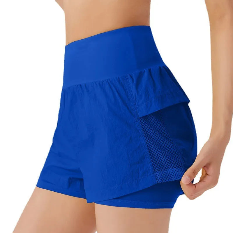 Women's loose casual cotton blend quick-drying sports shorts in multiple colours on a hanger.