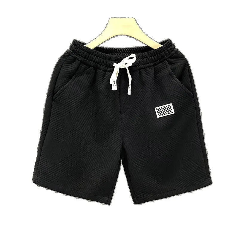 Men's casual polyester sports shorts in solid colours with micro-elastic fabric for beach and sports activities