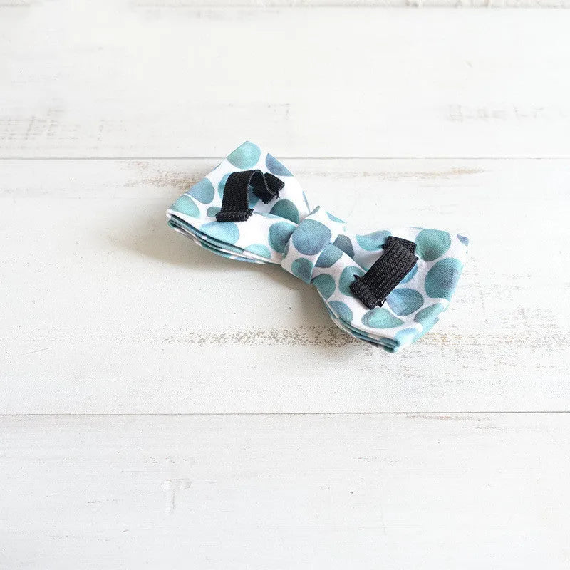 Polyester pet bow collar jewellery in bubble colour on a light background showing size options XS to XL