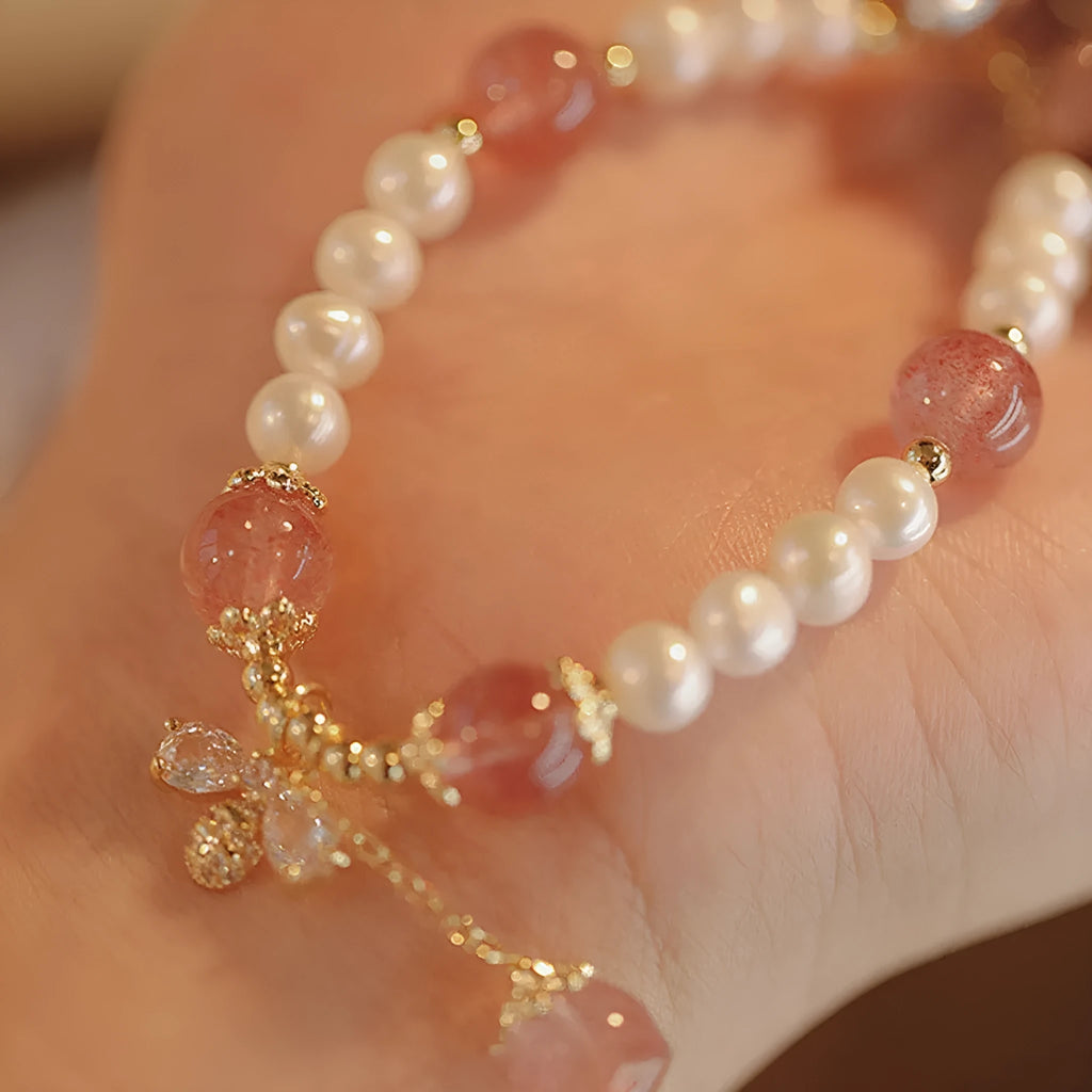 Strawberry quartz crystal bracelet with bow detail and stringed pearls for women