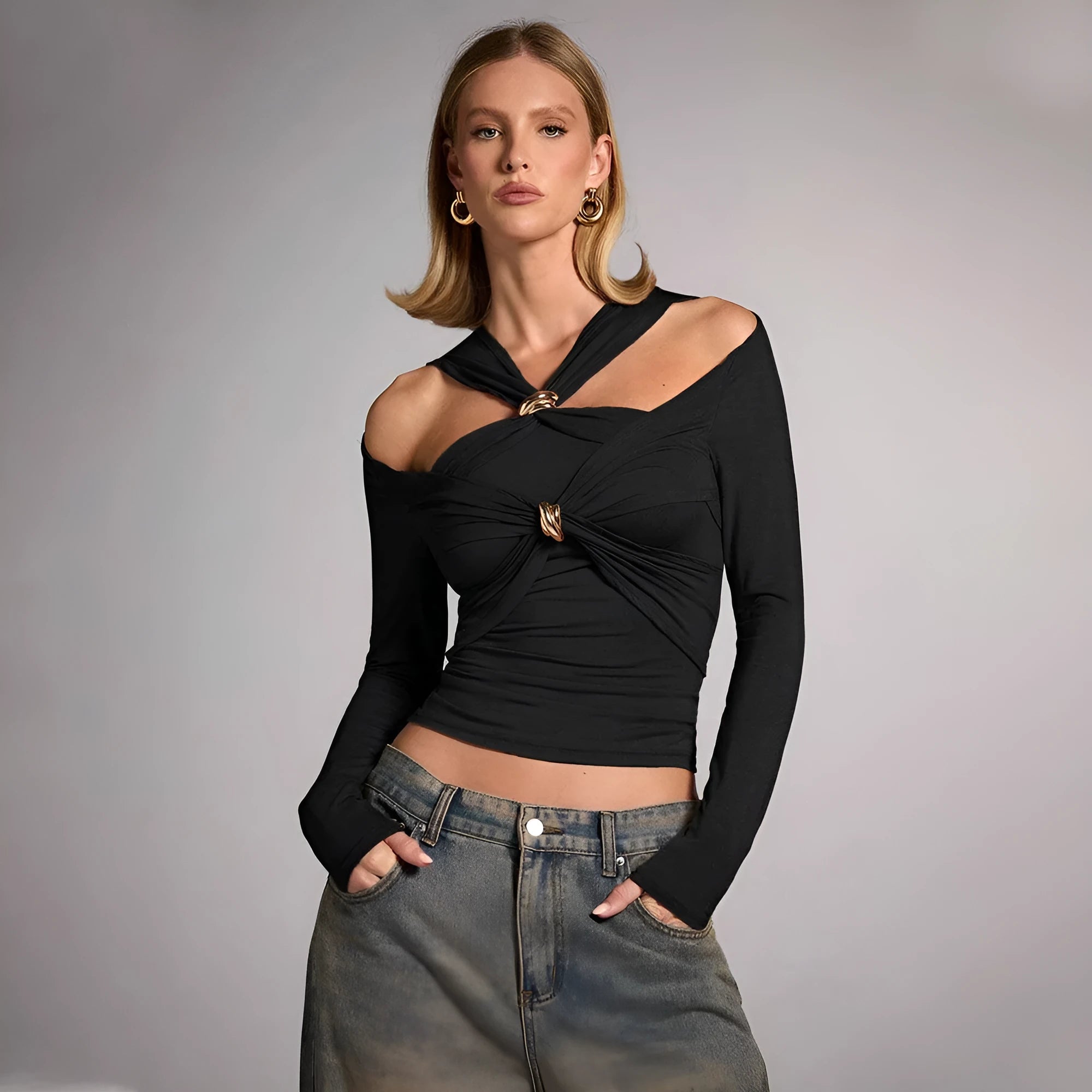 Black women's halter top with strapless shoulder-baring design and slim fit silhouette