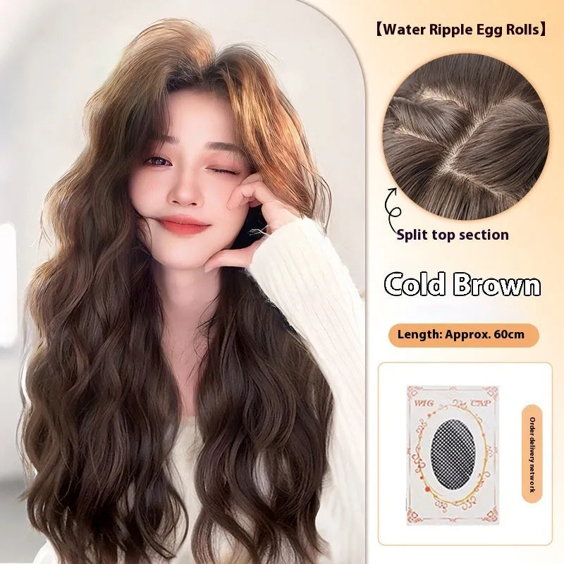 Women's full head wig with long curly artificial hair and side bangs in natural styling