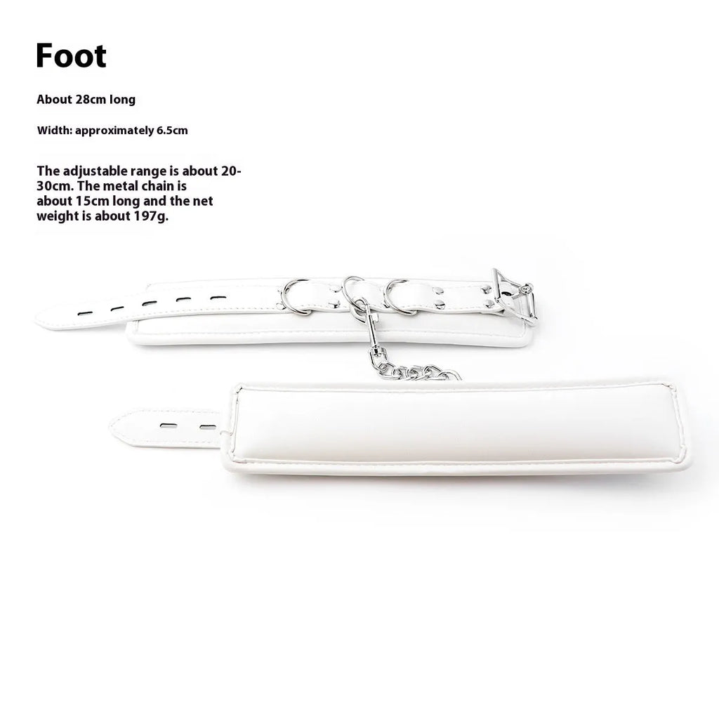 White PU sponge bondage restraint set showing handcuffs, foot cuffs, and neck scarf