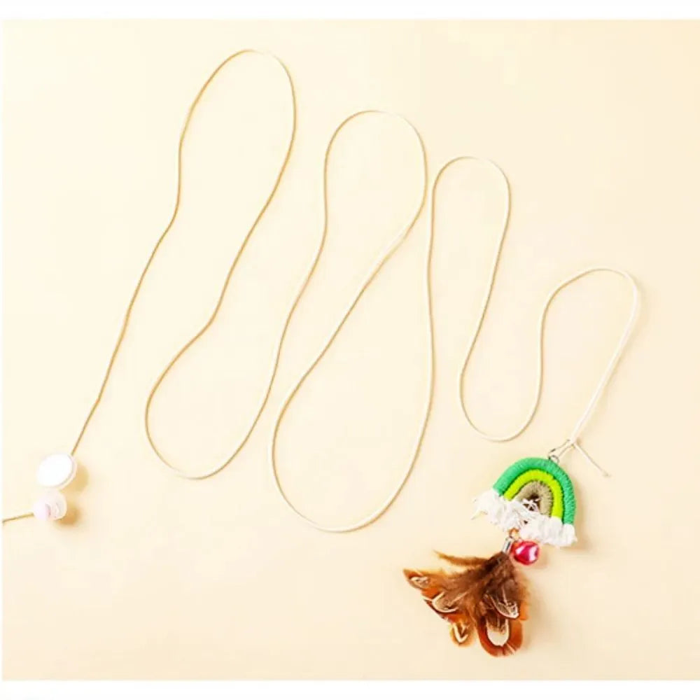 Blue feather rope cat toy hanging from door with elastic swing and sticky buckle clamp
