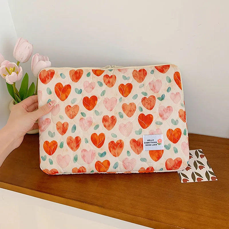 Floral print laptop bag for women in green flower pattern showing storage compartments and slim profile