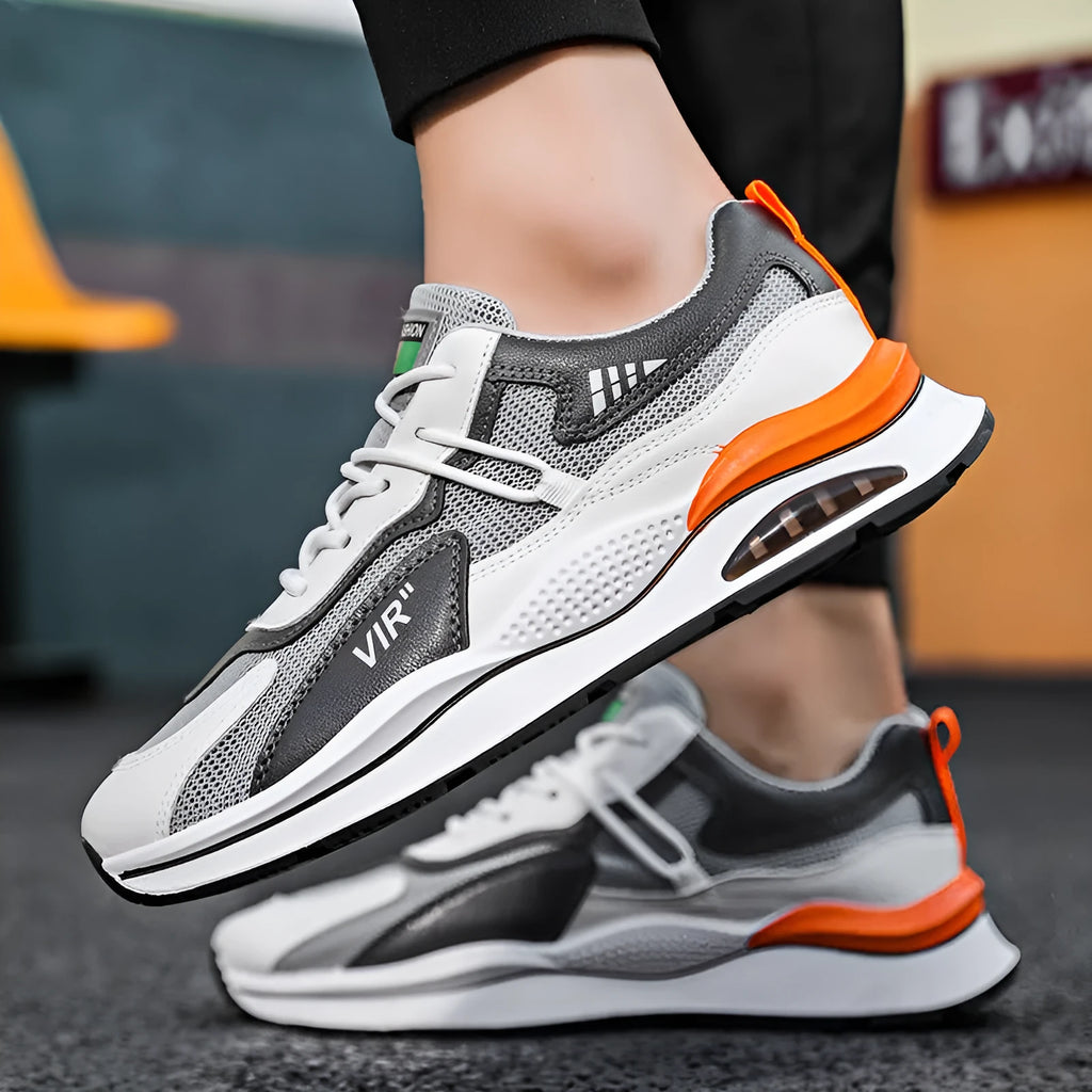 Men's grey breathable mesh casual running shoes with a round toe and EVA sole on a white background.