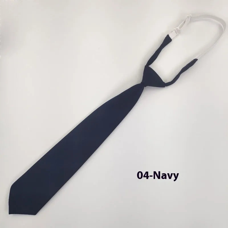 Men's solid colour cotton bow tie in arrow style showing navy blue option