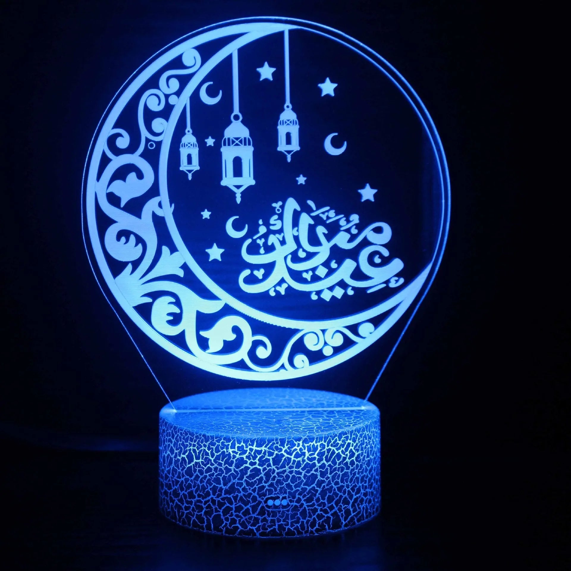 3D small night lamp with LED colourful lighting and black base on bedside table