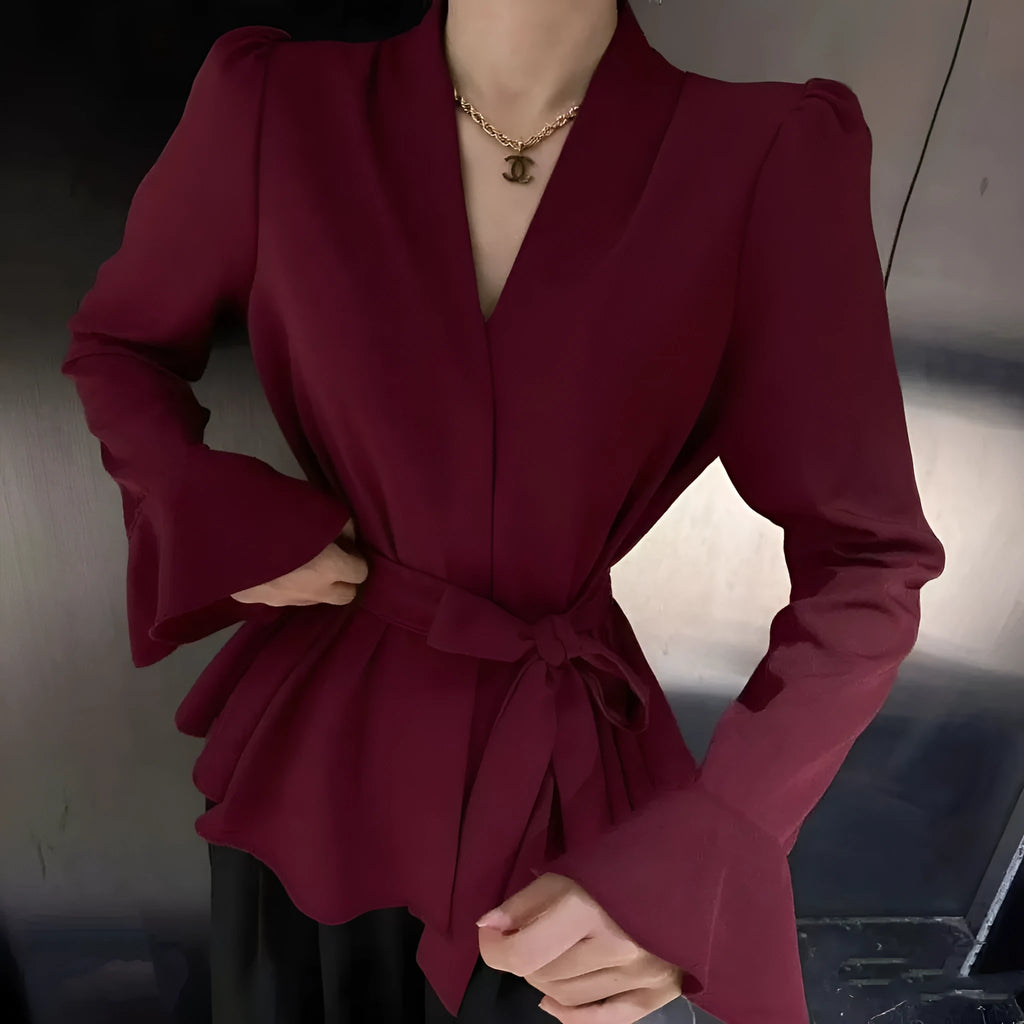 Women's French-style irregular collar shirt with long bell sleeves and tie front detail in polyester fabric.