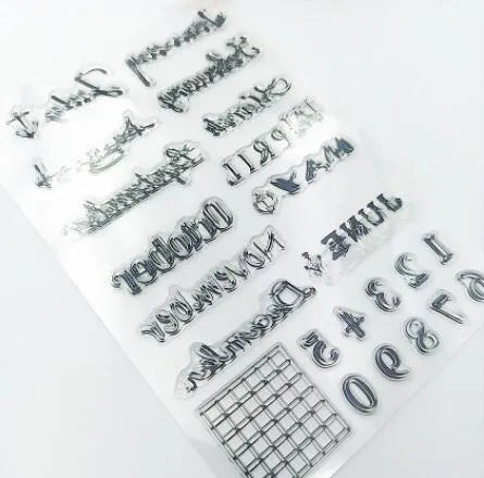 Vintage icon seal calendar stamp in transparent silicone on a crafting surface.
