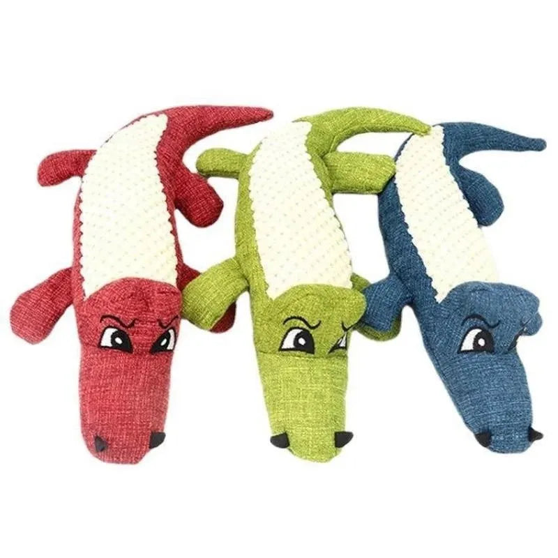 Blue corn-shaped plush dog toy with grid texture on a white background.
