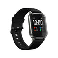 Black waterproof smart bracelet with 1.4-inch screen on silicone wrist strap showing heart rate display