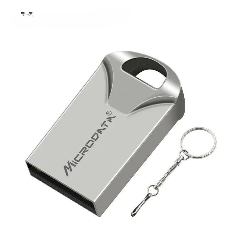 Car-shaped silver metal USB drive on a detachable chain, showing compact size.