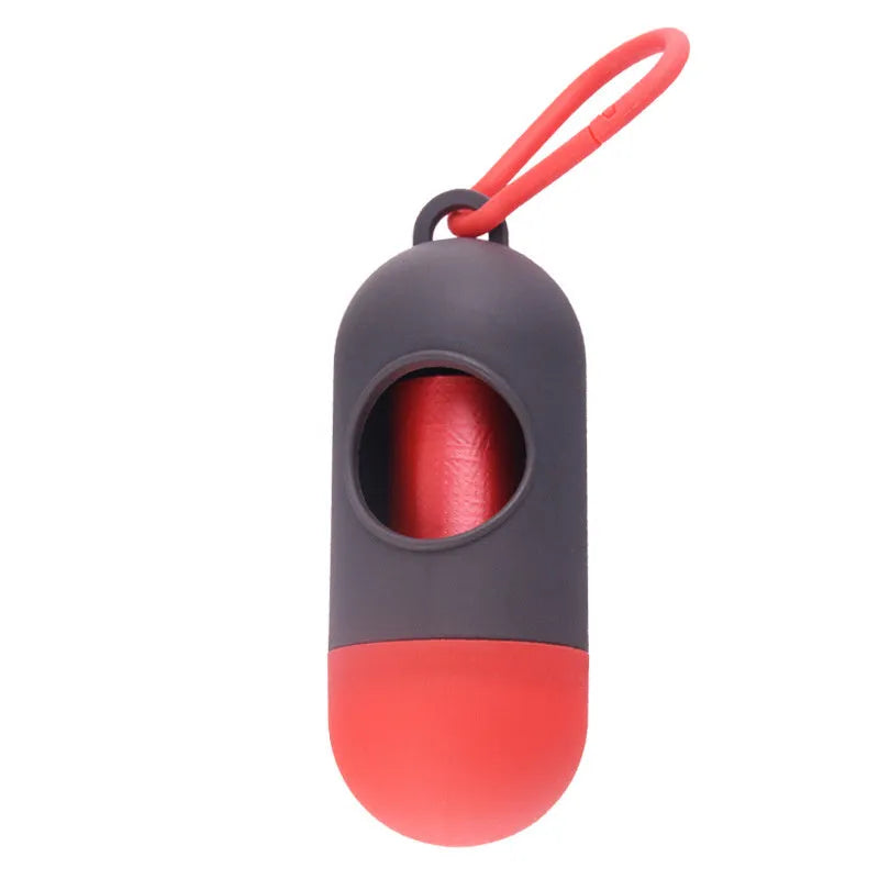 Compact black dog waste bag holder with side hook and velcro base for attaching to trousers or dog collars