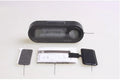Black electronic car dashboard clock with LED display showing time and temperature