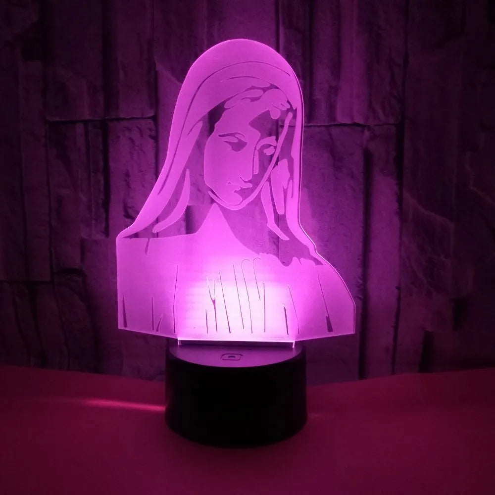 3D LED night light showing illuminated blue dual-ring pattern on acrylic plate with black ABS base.