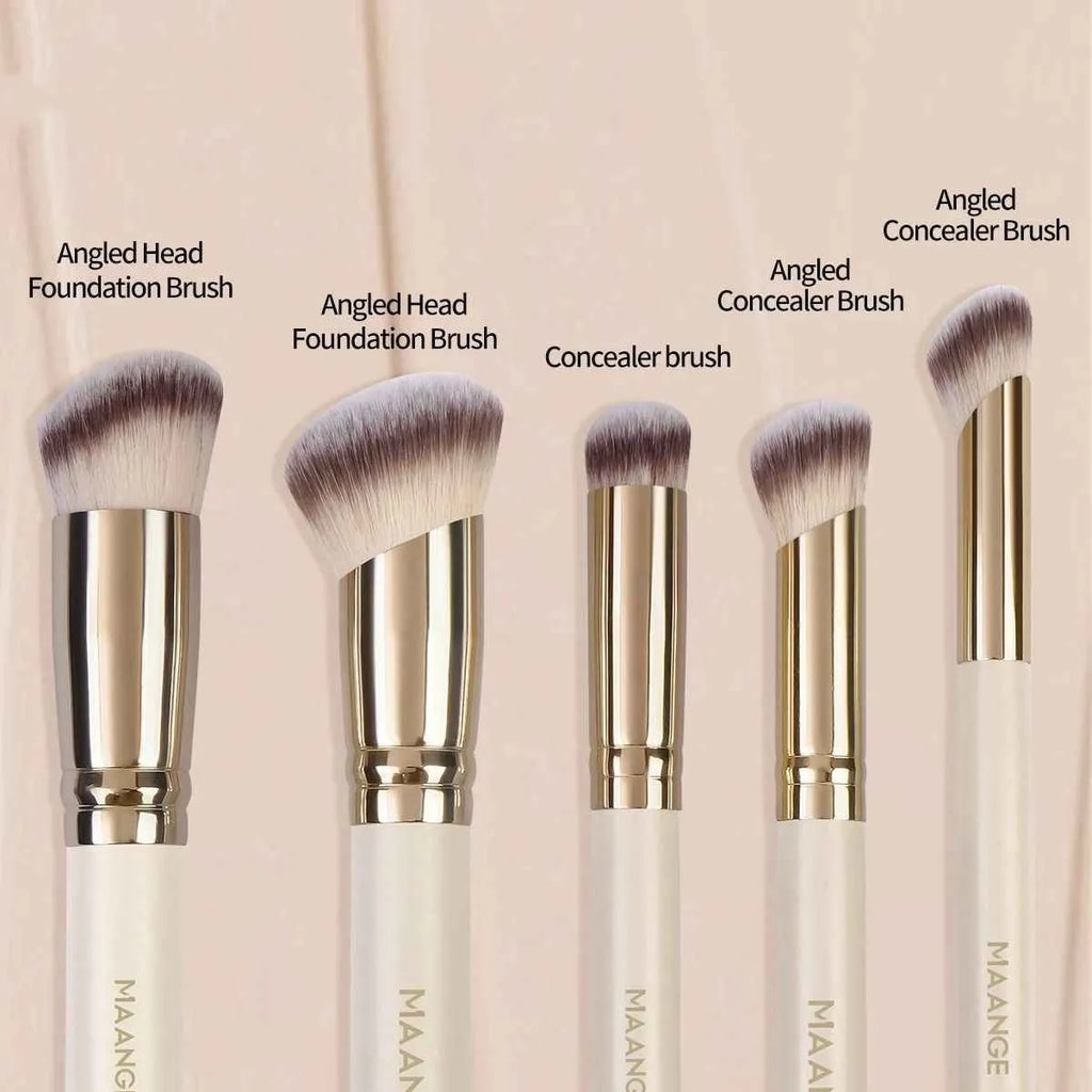 Apricot coloured angled makeup blush brush and four other synthetic brushes from a 5-piece set.