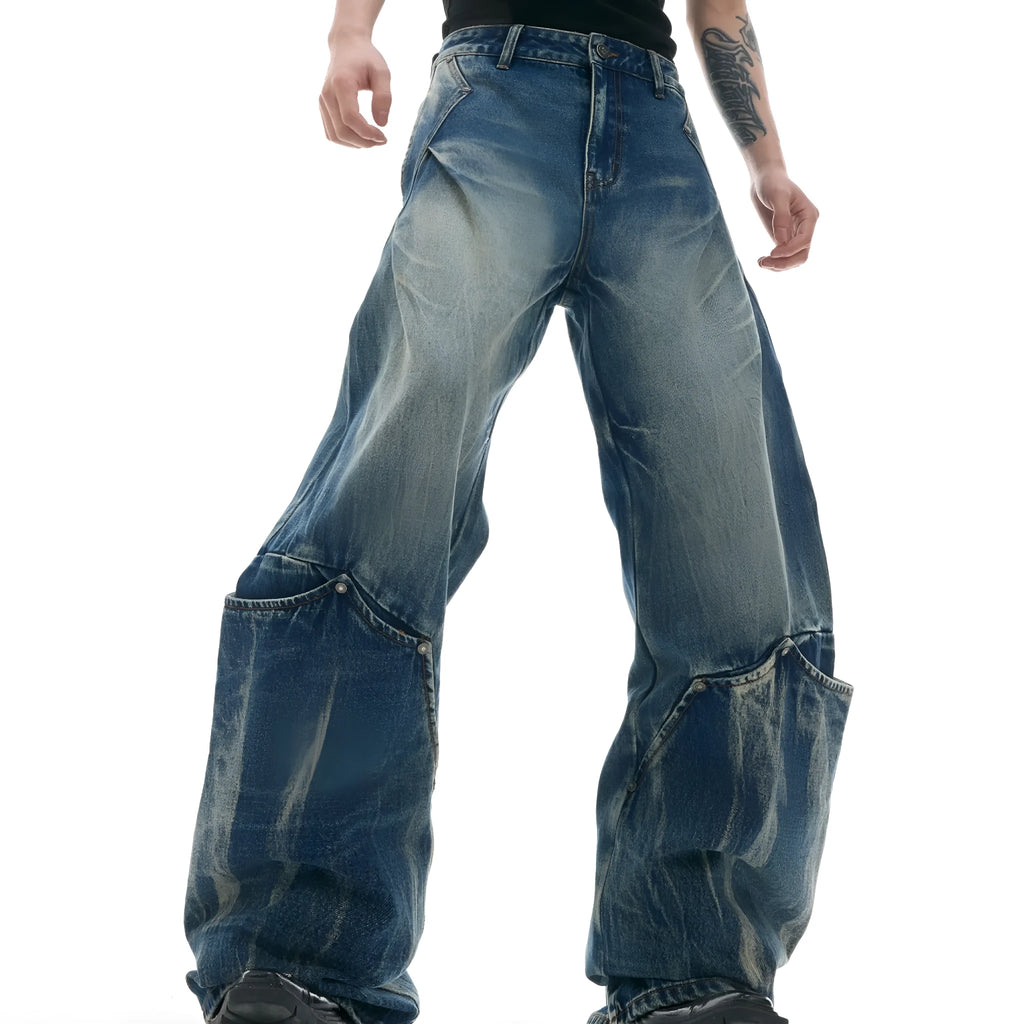 Men's verdant blue loose fit jeans with retro washed finish and curved knife design detail