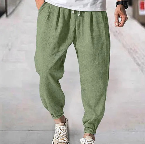 Men's loose cotton ankle pants with elasticated bands in light green colour