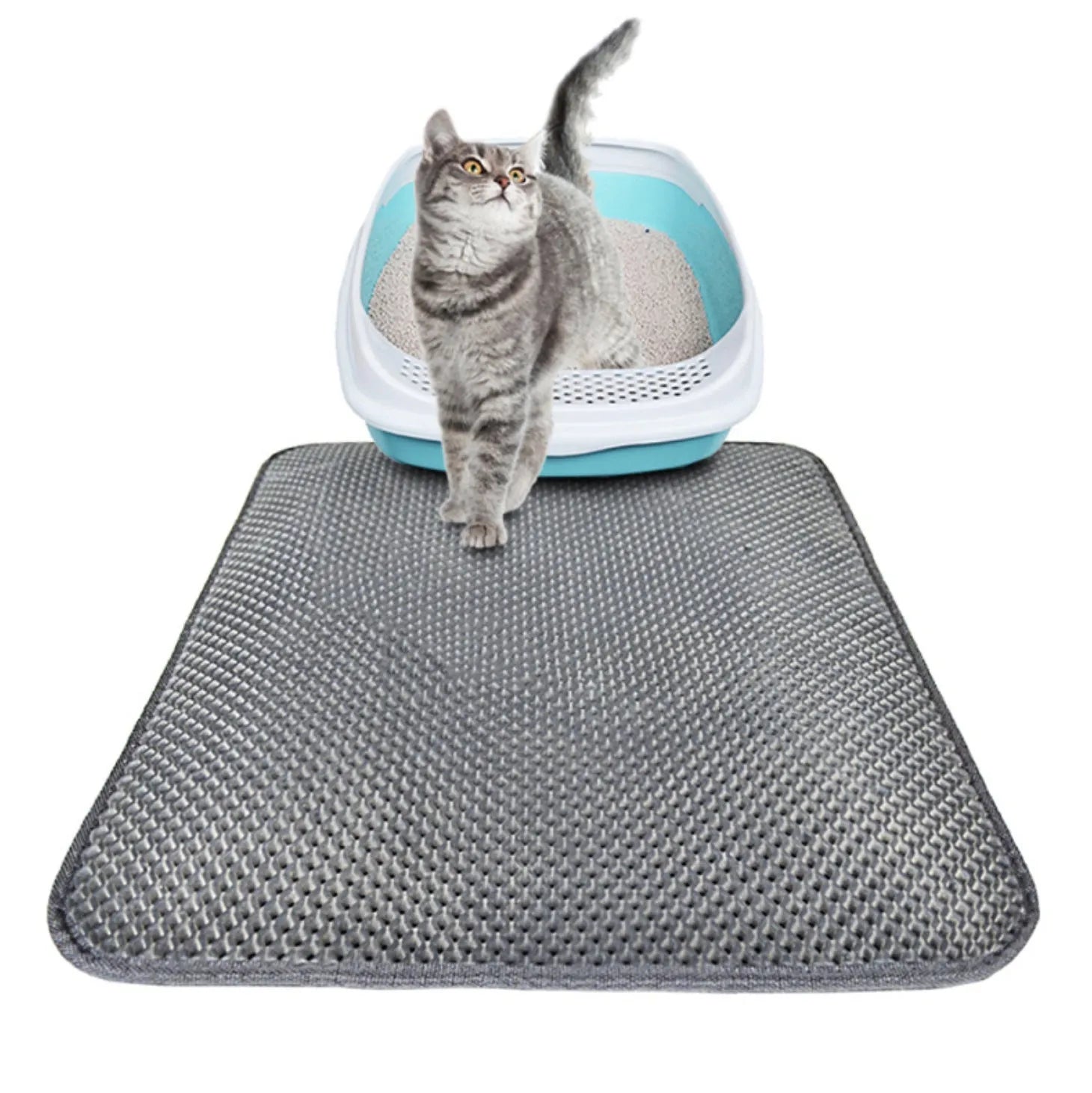 Double layer EVA cat litter mat in black with textured surface, placed under a litter box to trap debris