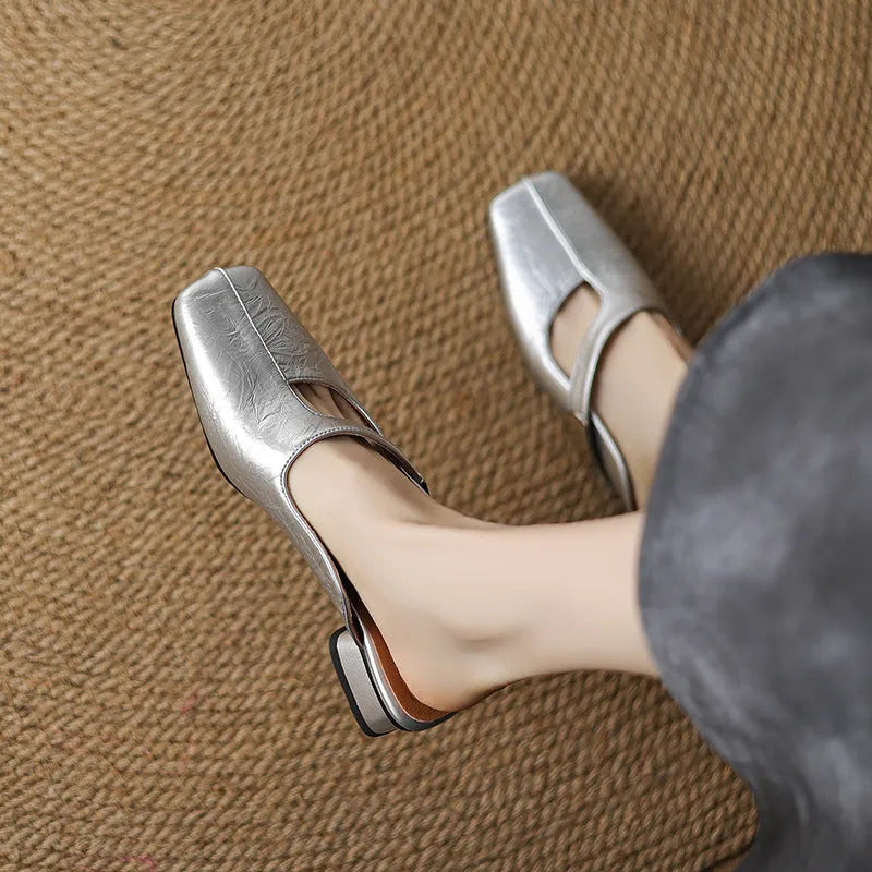 Square-toe casual slipper with low heel in beige, showing artificial PU upper and rubber sole.