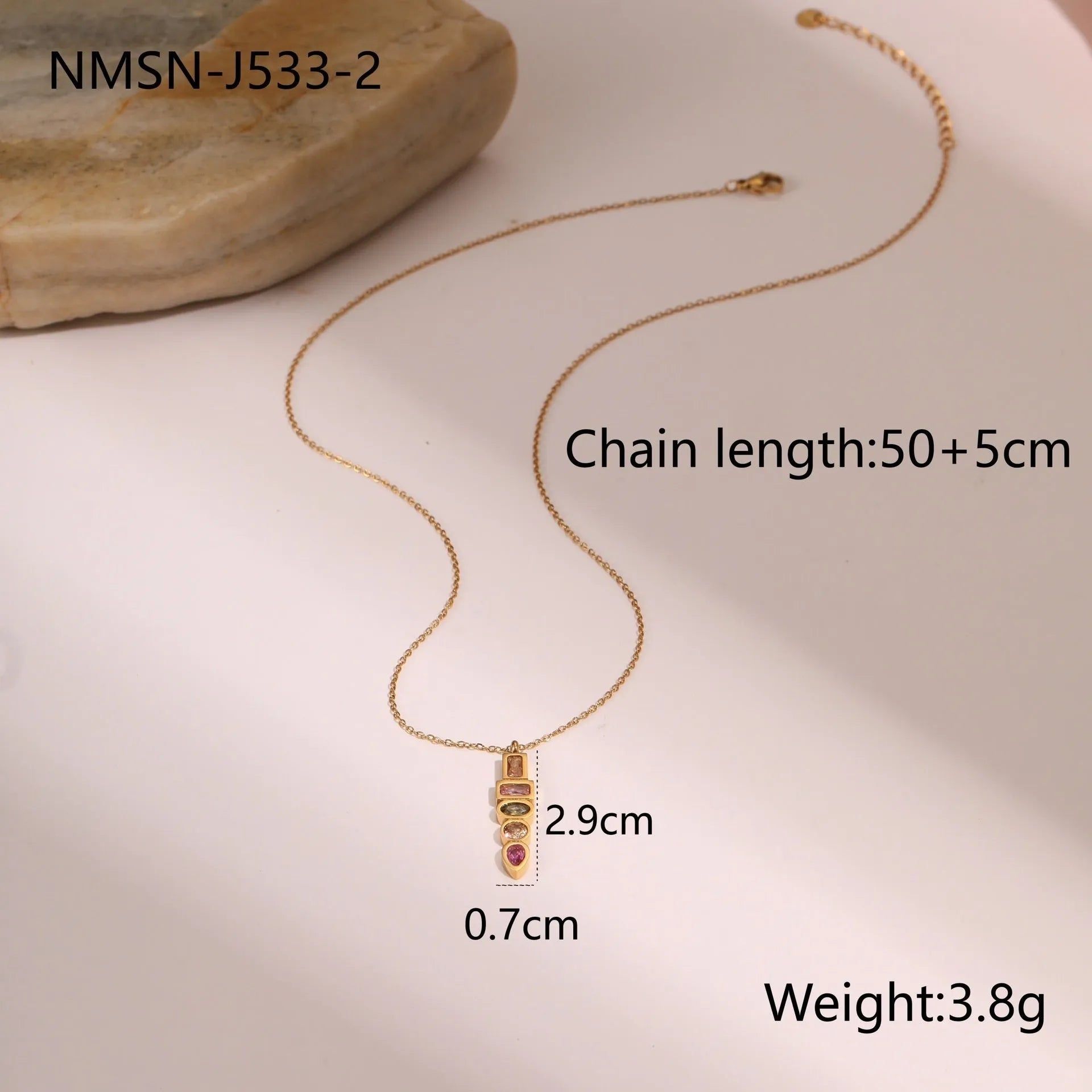 Gold plated geometric zircon jewellery set showing necklace, ring and earrings with stainless steel chain