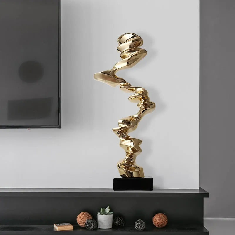 Abstract still life sculpture in Ran Ran Rose bright gold, elegant silver, or phantom blue.