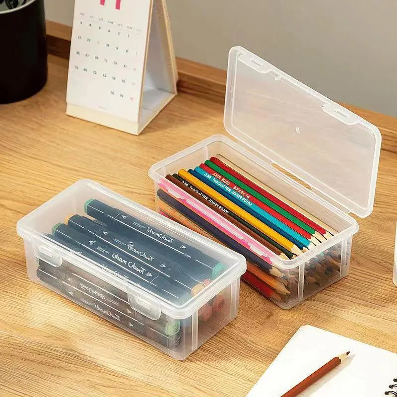 Clear plastic large capacity pencil storage box filled with coloured pencils and art supplies