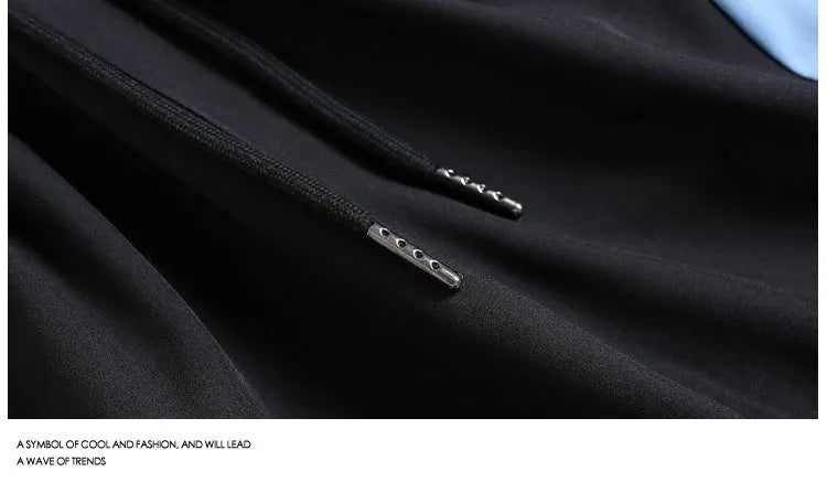Loose-fit black sports shorts with elastic waistband and straight-leg design for training.