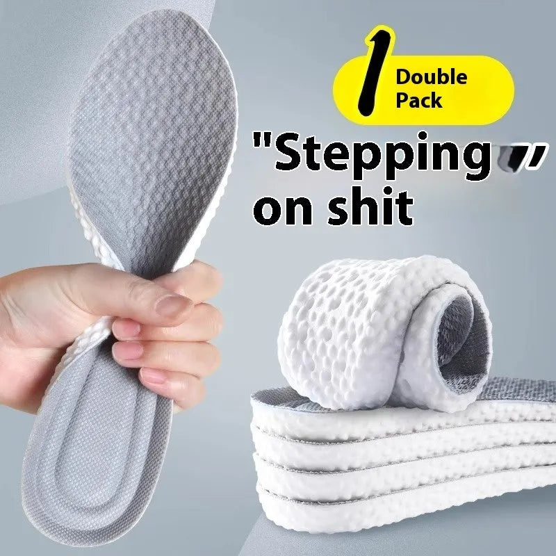 Grey, black, and orange breathable sports insoles made from soft PU material, shown alongside scissors for cut-to-fit sizing.