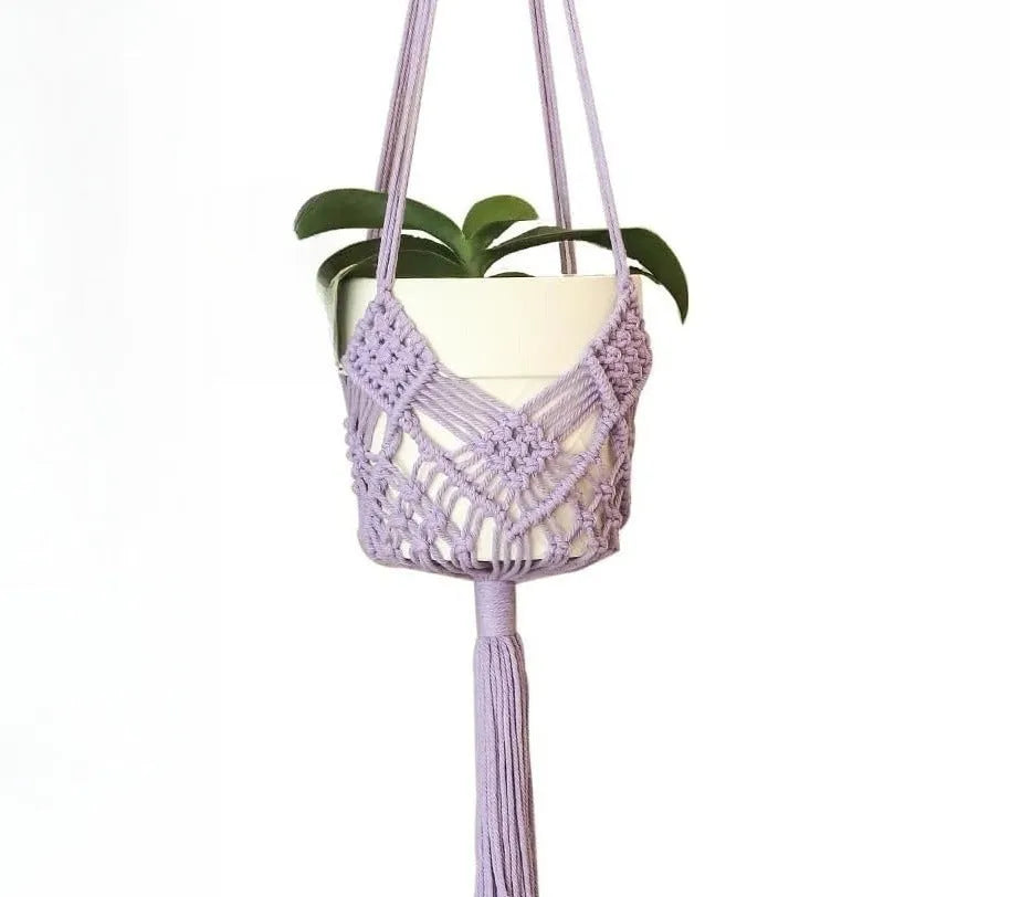 Handwoven brown polyester cotton flower pot net sleeve covering a plant pot.