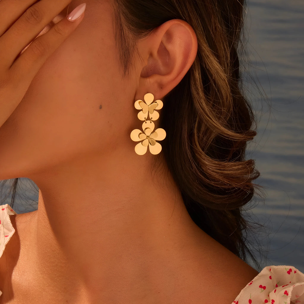 Gold flower butterfly stainless steel earrings with 18K electroplated finish and floral design elements