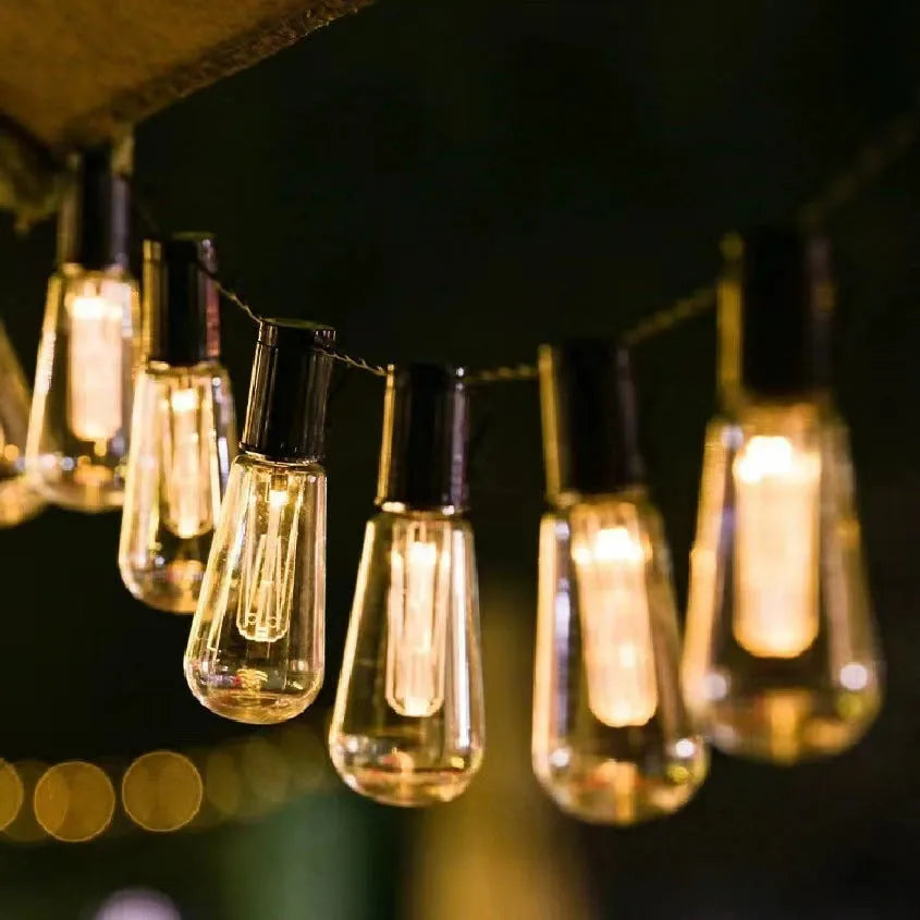 Vintage infusion bottle shaped outdoor string lights with solar panel and IP55 waterproof rating