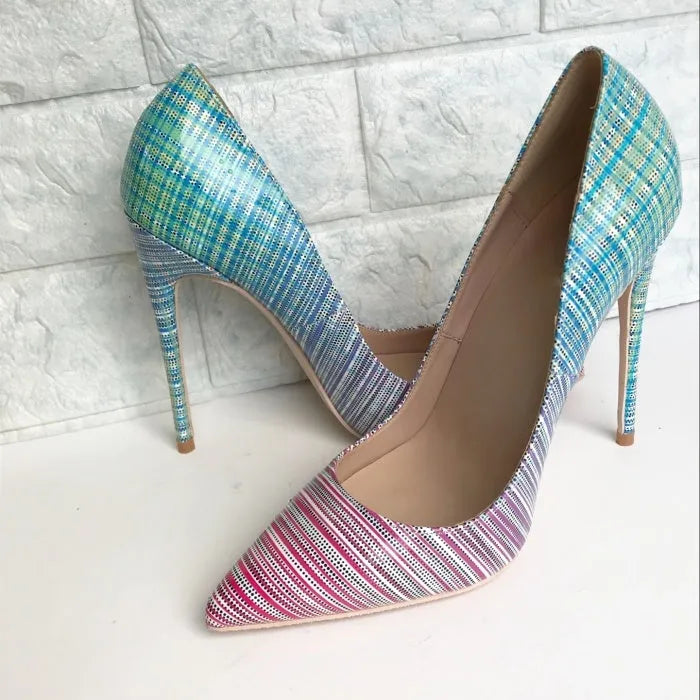 Ladies pointed toe patent leather heels with a pink to blue gradient colour and a high thin heel.
