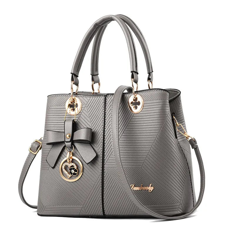 Retro-style PU leather handbag with zipper and one-shoulder strap in multiple colours.