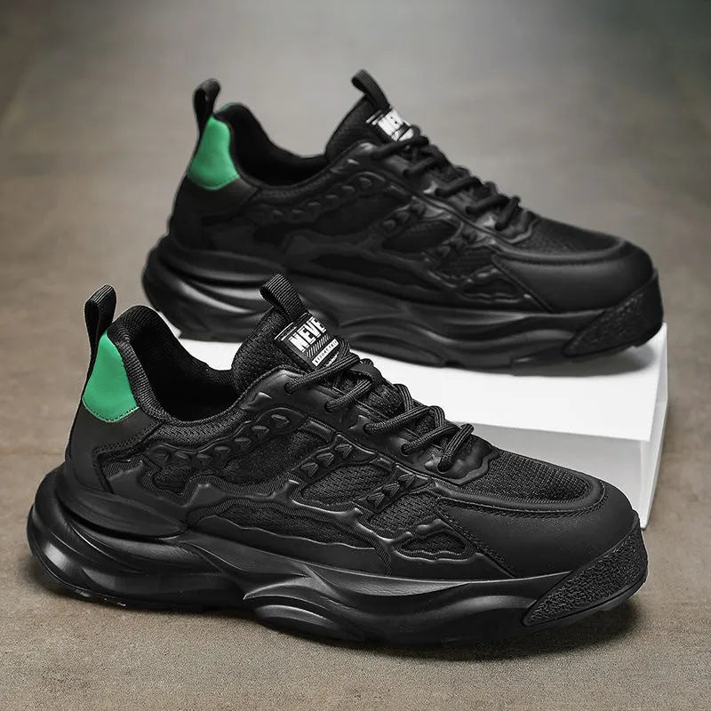 Men's white and black breathable mesh casual shoes with round toe, shown from the side.