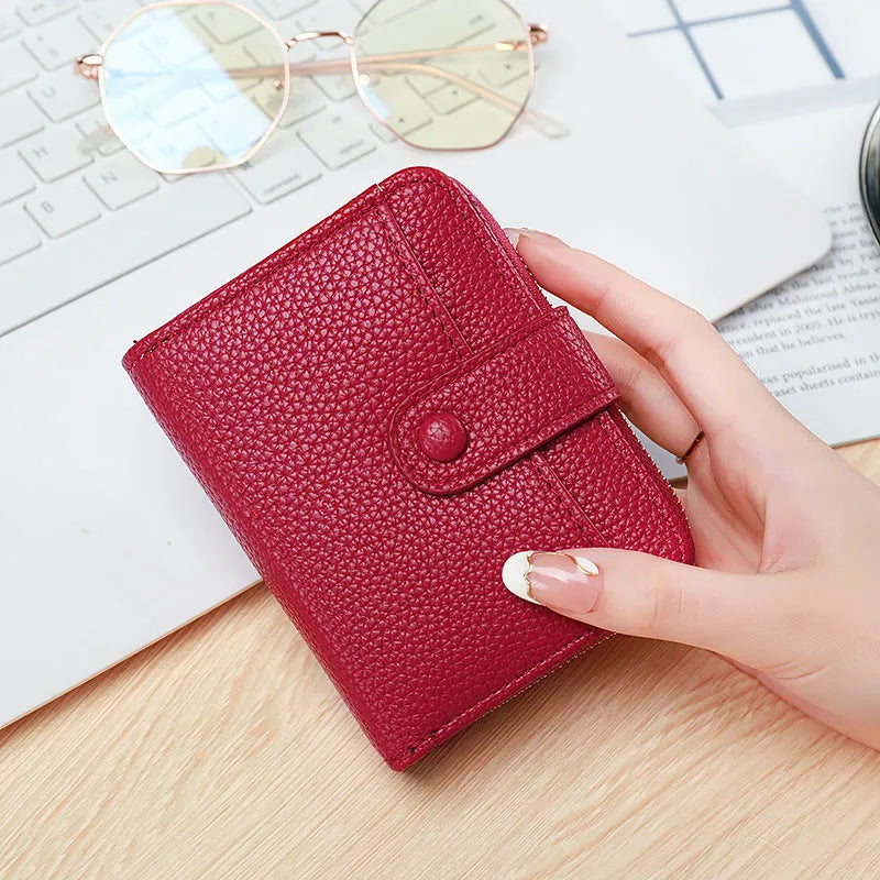Ladies' short wallet with lychee pattern in beige, showing 2-fold design and card slots