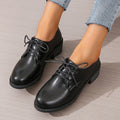 Black women's work shoes with chunky heel and soft rubber sole