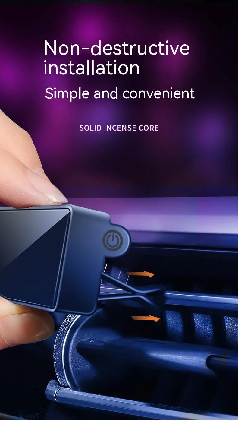 Black car air vent aromatherapy diffuser with LED light showing fragrance stick compartment