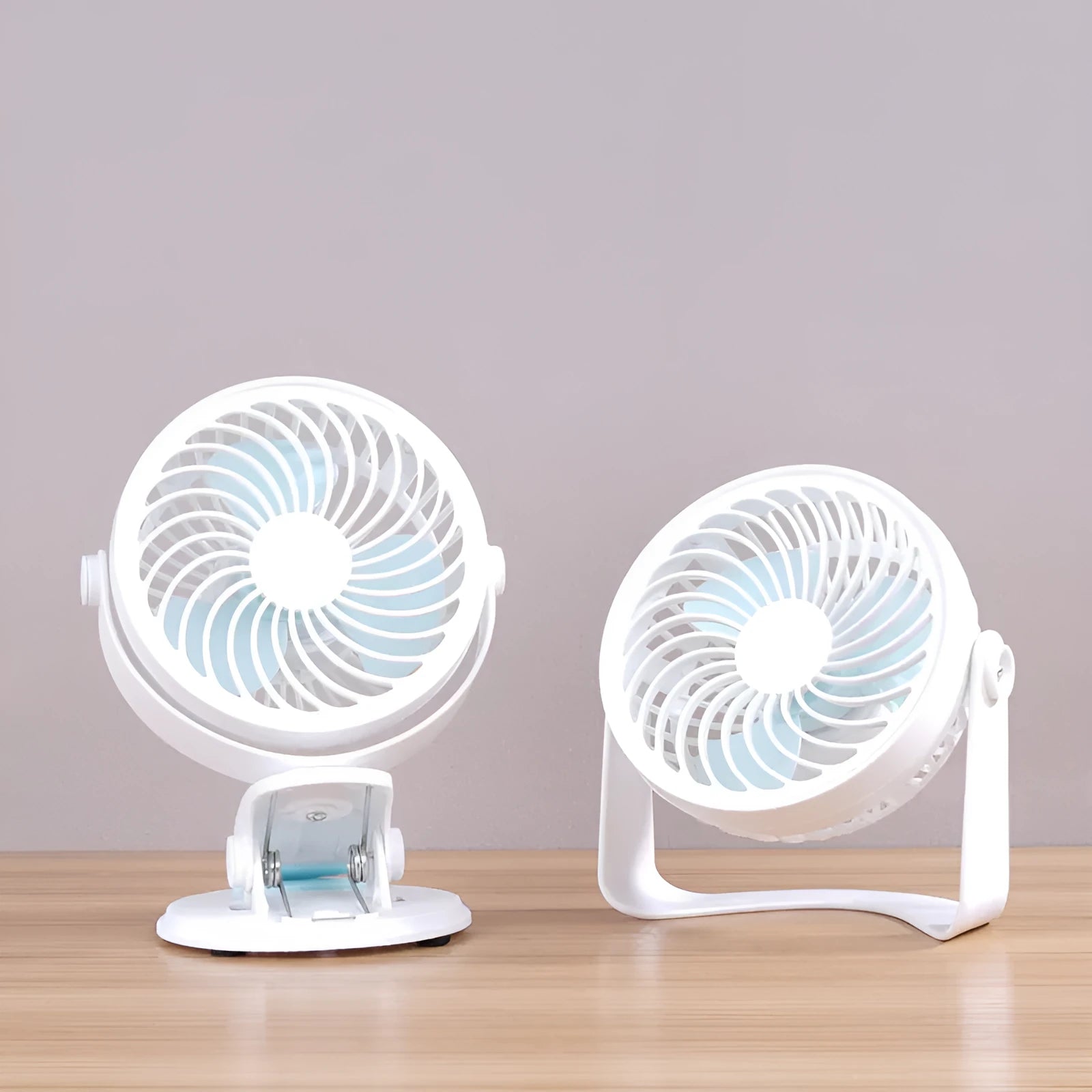 USB desk fan showing compact design with three blades, available in clip-mount or floor-standing styles