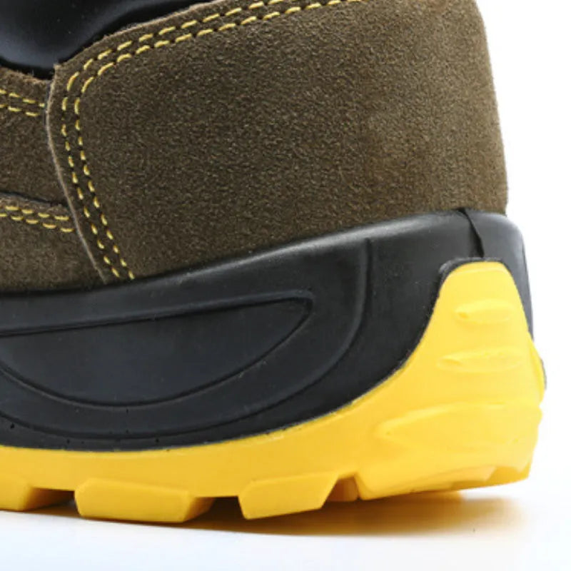 Bronze coloured low-cut steel toe safety boots with a cowhide suede upper and solid rubber sole.