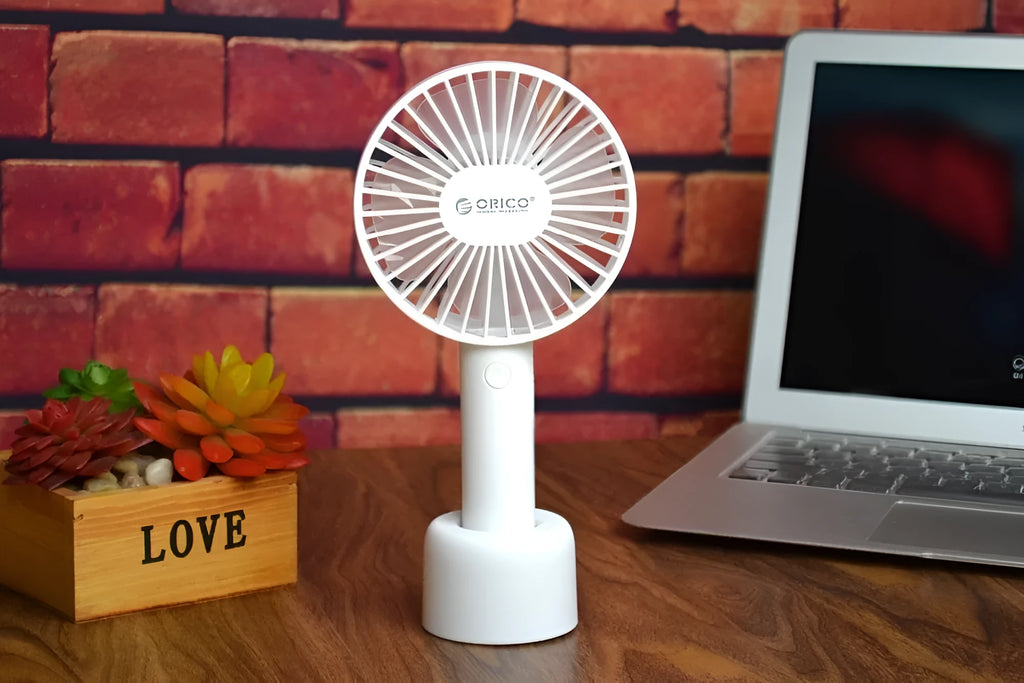 ORICO FH1 white USB rechargeable desk fan with handheld portable design and three-speed control
