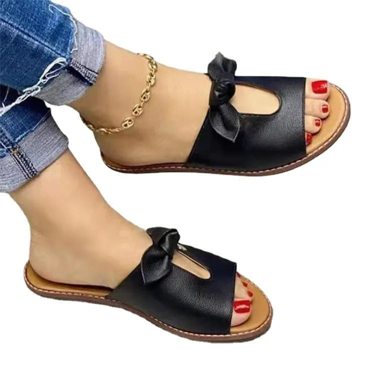 Ladies casual sandals with bow decoration and fish mouth design in black, pink, and gold colours