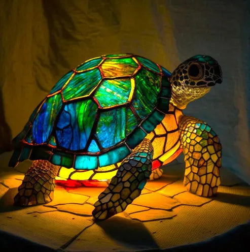 Colourful resin dog lamp decoration in pug shape, button battery powered, on a shelf