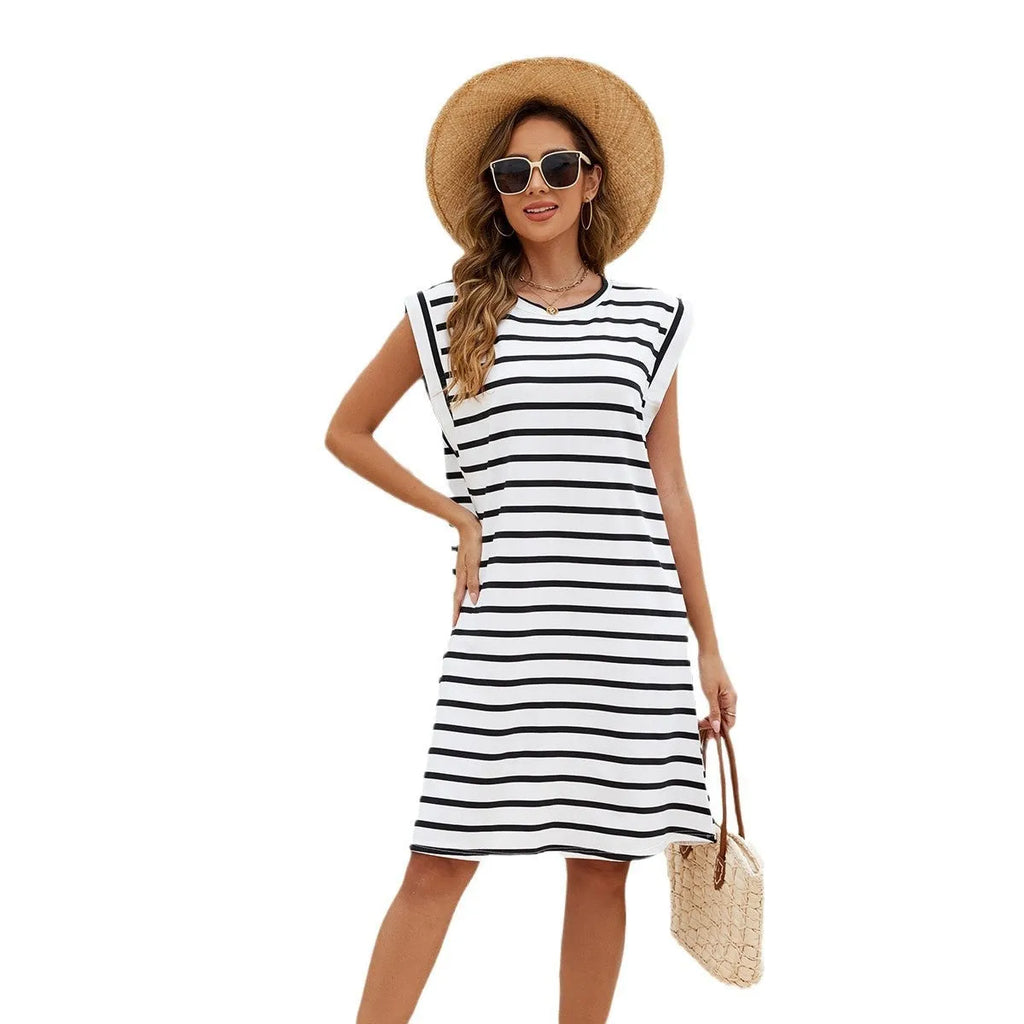 Black and white striped polyester beach cover-up blouse for women showing loose fit design