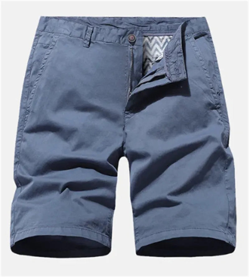Men's loose fit blue denim casual shorts with no belt, shown in a straight cut short length